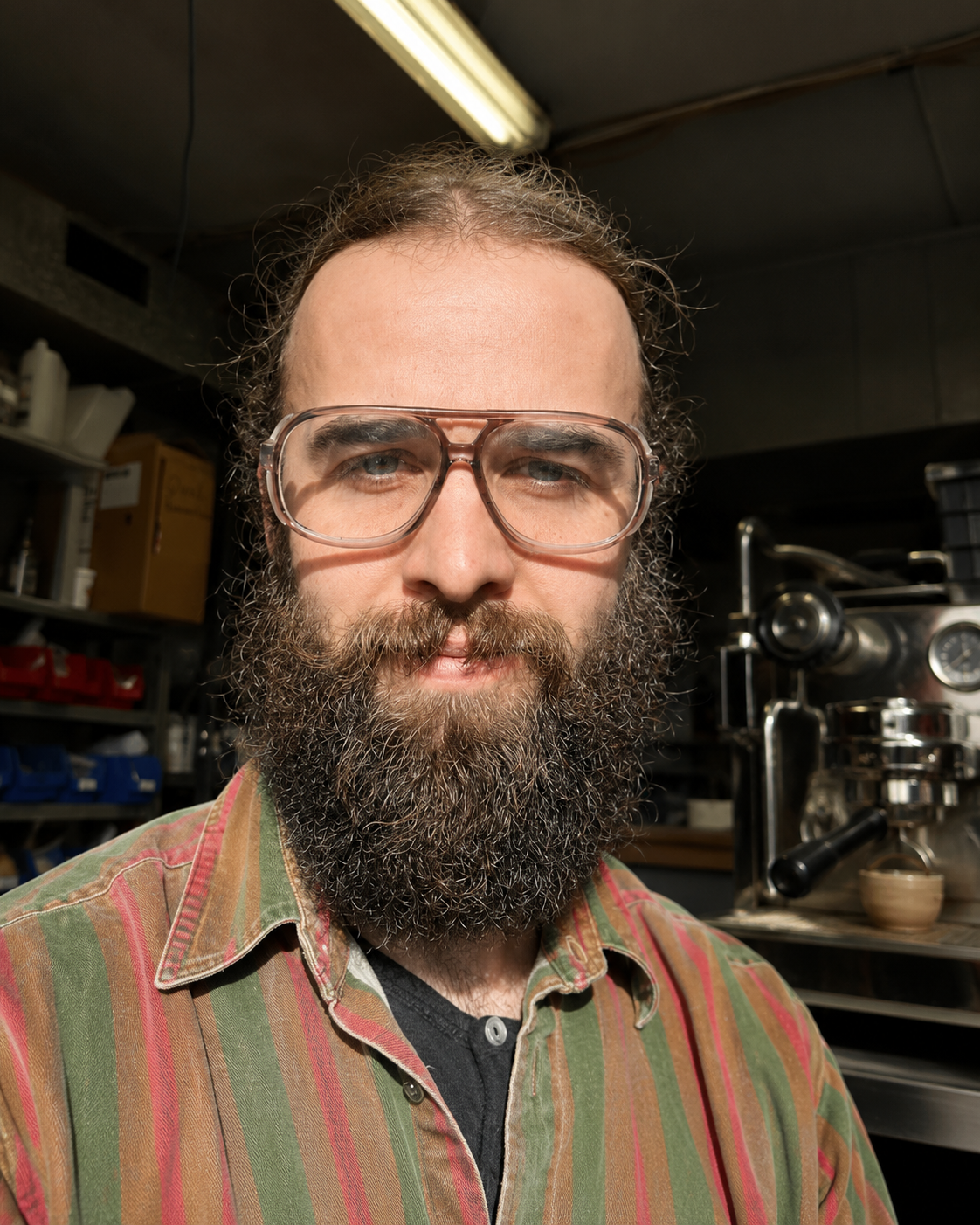 Mac, espresso machine technician, in the workshop